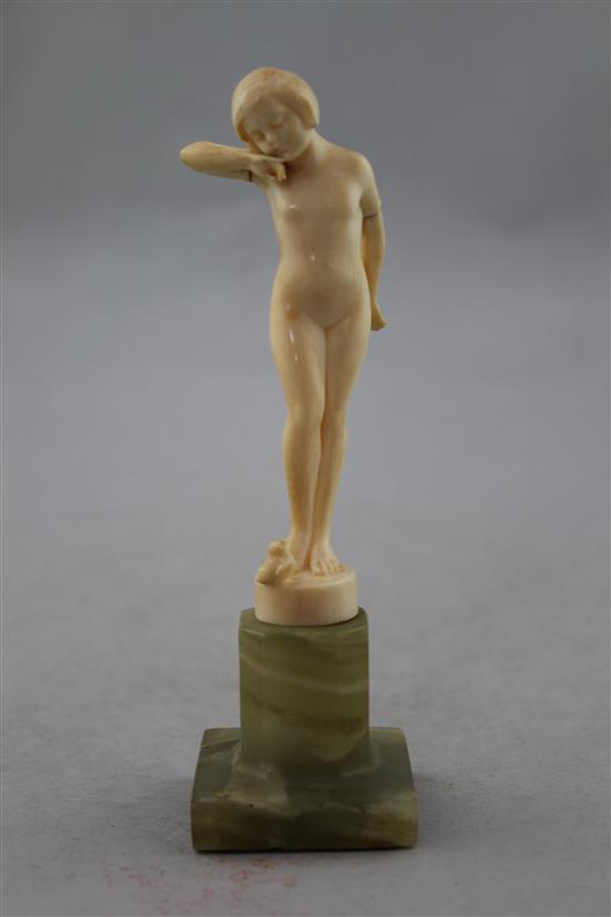 Attributed to Ferdinand Preiss, An Art Deco carved ivory figure of a young girl, 6in.